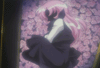 Utena hiding in a rose-filled coffin